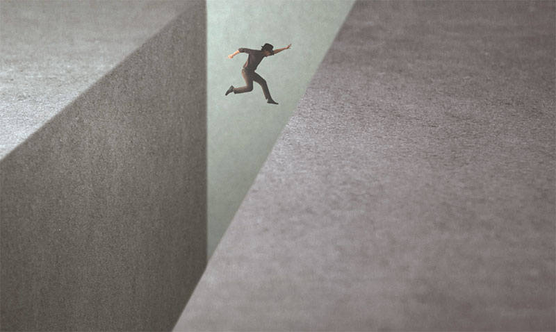 Image of man leaping across a wide gap